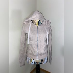 Cream/beige zip up sweater. Size: S. W/ draw string and hoodie.